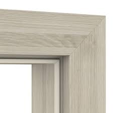 Close-up of a light wood frame corner with a white background visible through the opening.