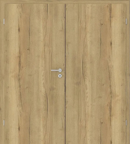 Double wooden door with a light oak wood grain finish, featuring a silver metal lever handle and lock on the center of the right panel.