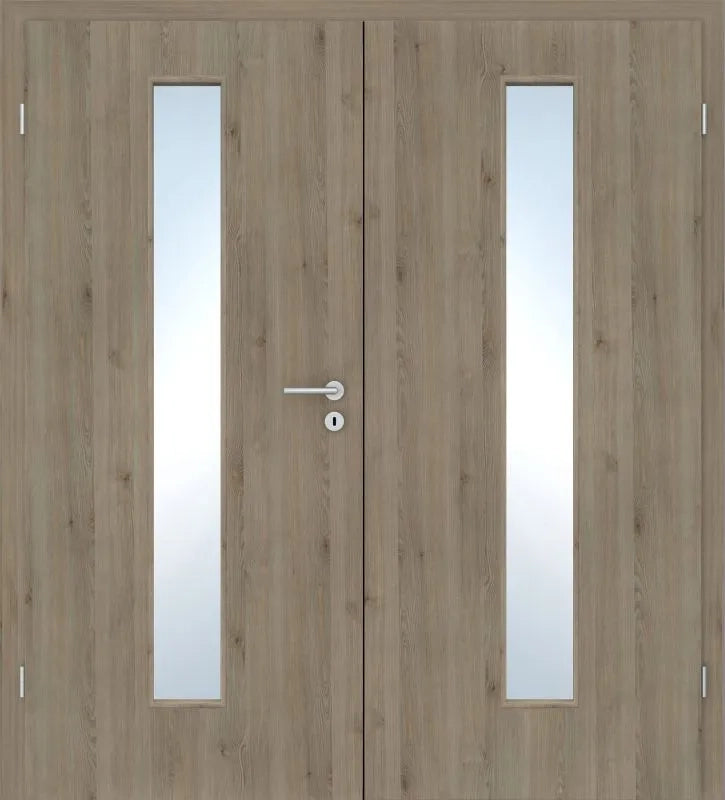 Double wooden doors with a light oak finish and two vertical frosted glass panels, featuring a silver metal lever handle and lock.
