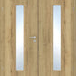A pair of light oak double doors with two vertical frosted glass panels, a silver metal handle, and a keyhole lock.