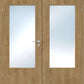 Wooden double door with glass panels on a white background