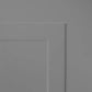 Close-up of a gray door with a rectangular panel