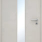 Light gray door with a narrow vertical glass panel and silver handle.