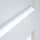 Close-up of a white paneled door with a light beige frame edge visible along the top and bottom.