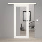 A modern white sliding glass door installed in a gray interior wall, with a matching white top rail and a small round silver knob.