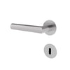 A modern minimalist door handle with a matching round keyhole cover plate, both finished in a brushed silver metal, shown against a plain white background.