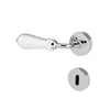 A modern door handle set featuring a polished chrome round backplate, a matching round keyhole cover, and a tapered white ceramic or glass handle, shown on a plain white background.