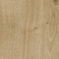 Close-up of a wooden surface with a light brown color and visible grain pattern.