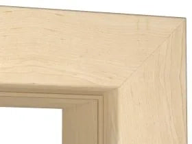 Close-up of a light natural wood frame corner showing the grain and finish against a white background.