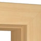 Close-up of a light natural wood frame corner showing the grain and beveled inner edge against a white background.