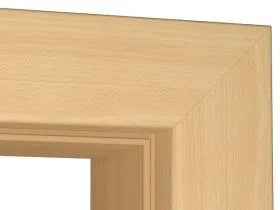 Close-up of a light natural wood frame corner showing the grain and beveled inner edge against a white background.