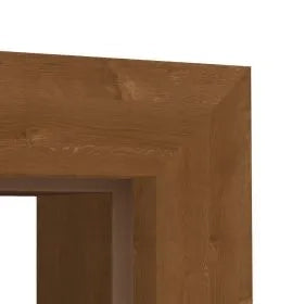 Close-up of a medium brown wooden door frame corner showing the wood grain texture against a white background.