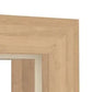 Close-up of a light oak wood frame corner with visible wood grain and a white interior surround.
