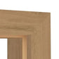 Close-up of a light oak wood frame corner showing the natural wood grain texture and a recessed opening.