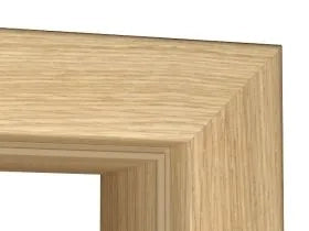 Close-up of a light oak wood picture frame corner showing the natural wood grain texture against a white background.