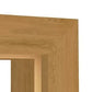 Close-up of a light oak wood frame corner showing the natural wood grain texture against a white background.