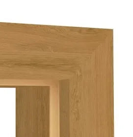 Close-up of a light oak wood frame corner showing the natural wood grain texture against a white background.
