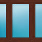 A three-pane window frame in a warm brown wood finish, with frosted or tinted blue glass panels in each section.