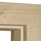 Close-up of a light natural wood picture frame corner showing the grain texture and beveled inner edge against a white background.
